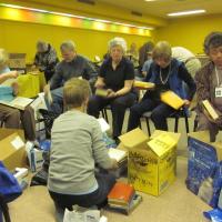 all-hands-readying-the-leftover-hardcovers-for-recycling