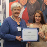 barbara-presenting-a-scholarship-to-nicole-lanegeomatics-surveying-engineering-technology-co-op-student-at-the-college-of-the-north-atlantic